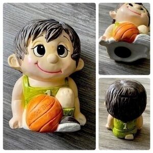 Vintage retro 1970s basketball boy player hand made ceramic money piggy bank.